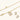 Gold-plated jewelry set with rectangular cubic zirconia stones in pave halo settings on cream background
