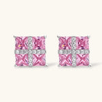 White gold plated jewelry set with pink cubic zirconia stones in geometric cross design, featuring Y-necklace and square stud earrings