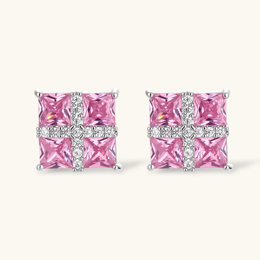White gold plated jewelry set with pink cubic zirconia stones in geometric cross design, featuring Y-necklace and square stud earrings