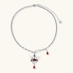 Eco-brass crown pendant necklace with red enamel details and dangling zirconia stone on chunky adjustable chain