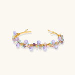 Gold-plated adjustable cuff bracelet with clustered lavender fluorite, turquoise beads, and freshwater pearls on white background.