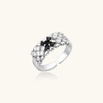 Adjustable white gold plated ring with geometric grid of black and clear zirconia stones in checkerboard pattern