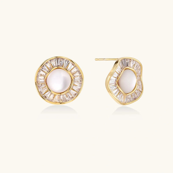 Gold-plated stud earrings with central freshwater pearl surrounded by radiating baguette crystals in sunburst design