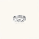 Braided stainless steel band ring with geometric interwoven strands in brushed silver finish on white background