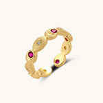 Gold-plated adjustable ring featuring alternating red and clear zircon stones set in geometric oval elements