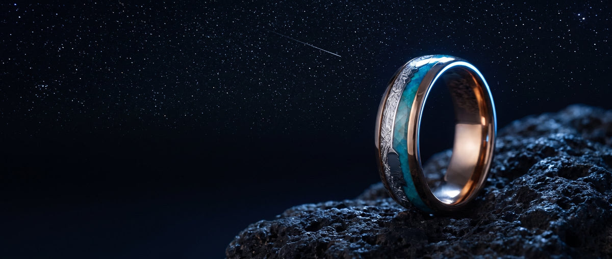 Meteorite ring for men on volcanic rock under a starry night sky